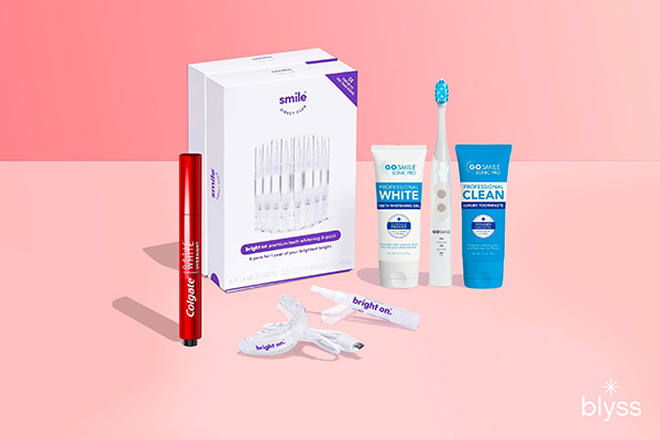 An image of a few examples of over-the-counter teeth whitening products